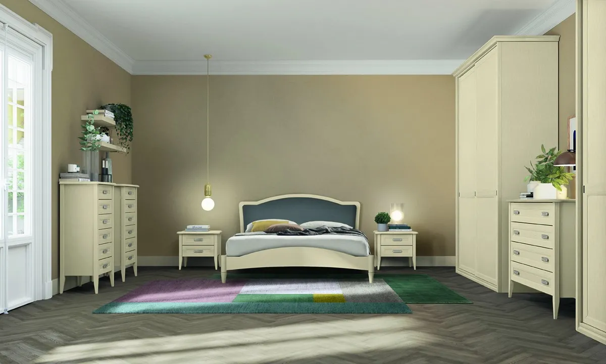 Letto classico Omega Colombini avorio con testata imbottita antracite tra due comodini