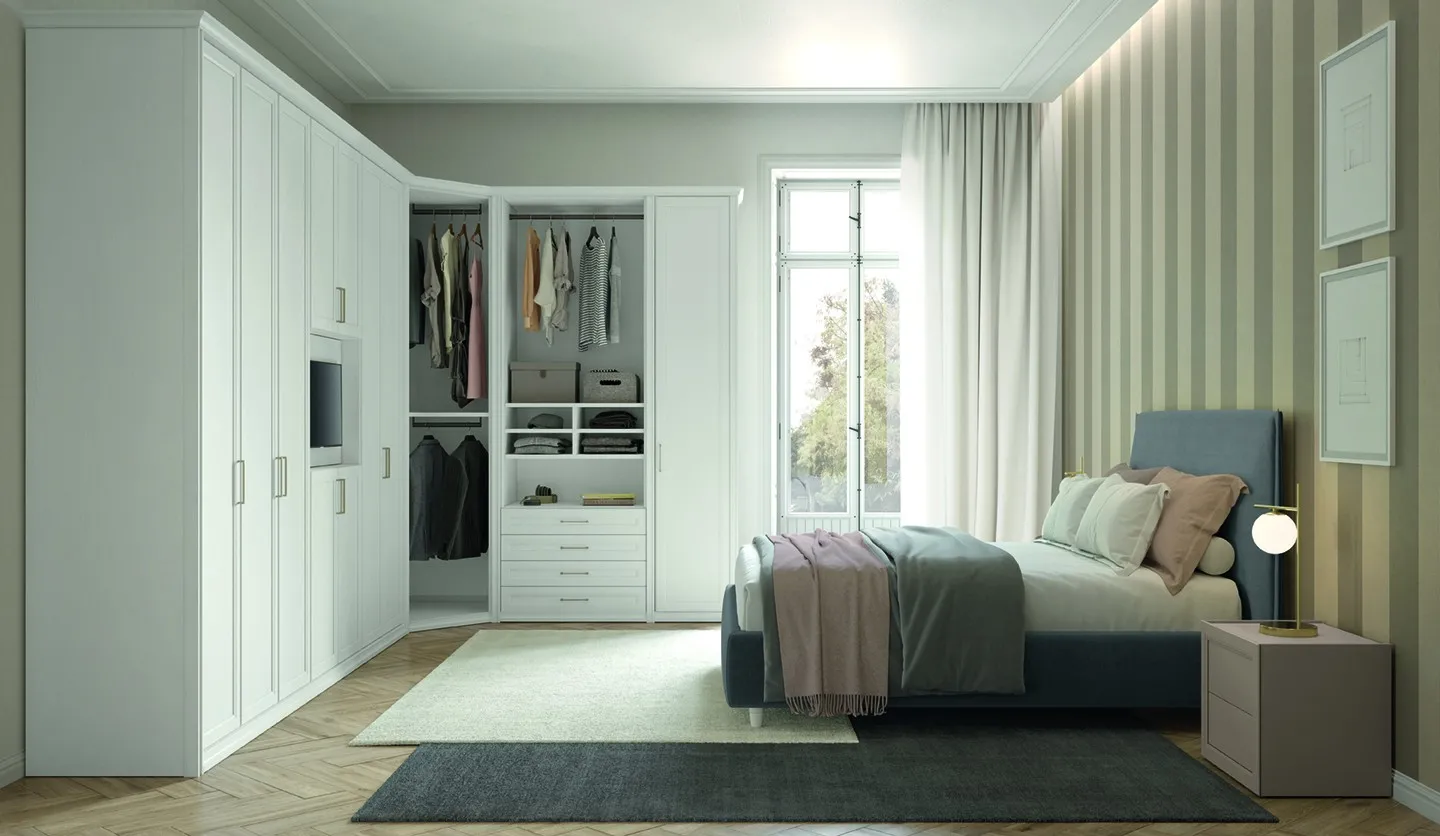 Letto singolo Norma Colombini grigio davanti a una cabina armadio aperta