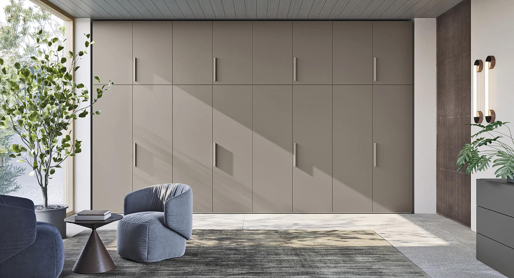 Armadio Concreta Colombini grigio caldo a tutta parete fino al soffitto