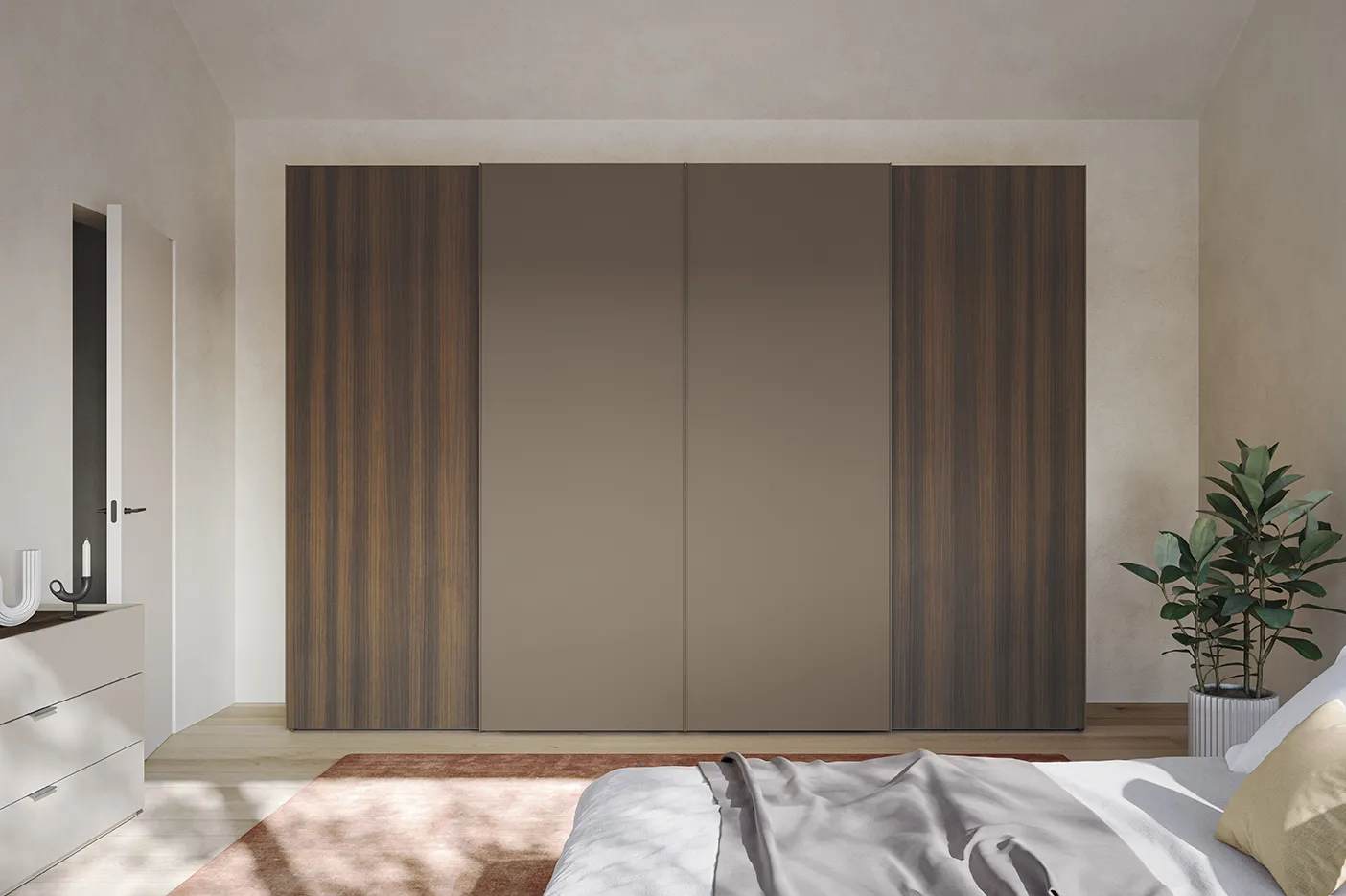 Armadio Style Colombini con ante scorrevoli in legno scuro e tortora di fronte al letto