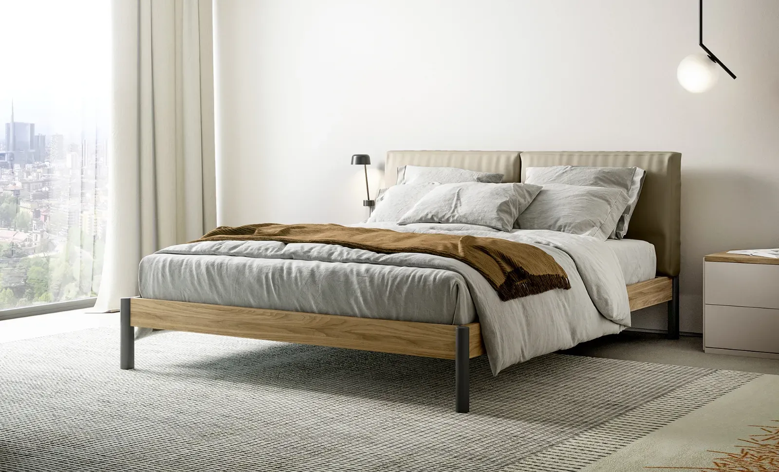 Letto Eden Soft Dielle Modus in camera luminosa con vista sulla città