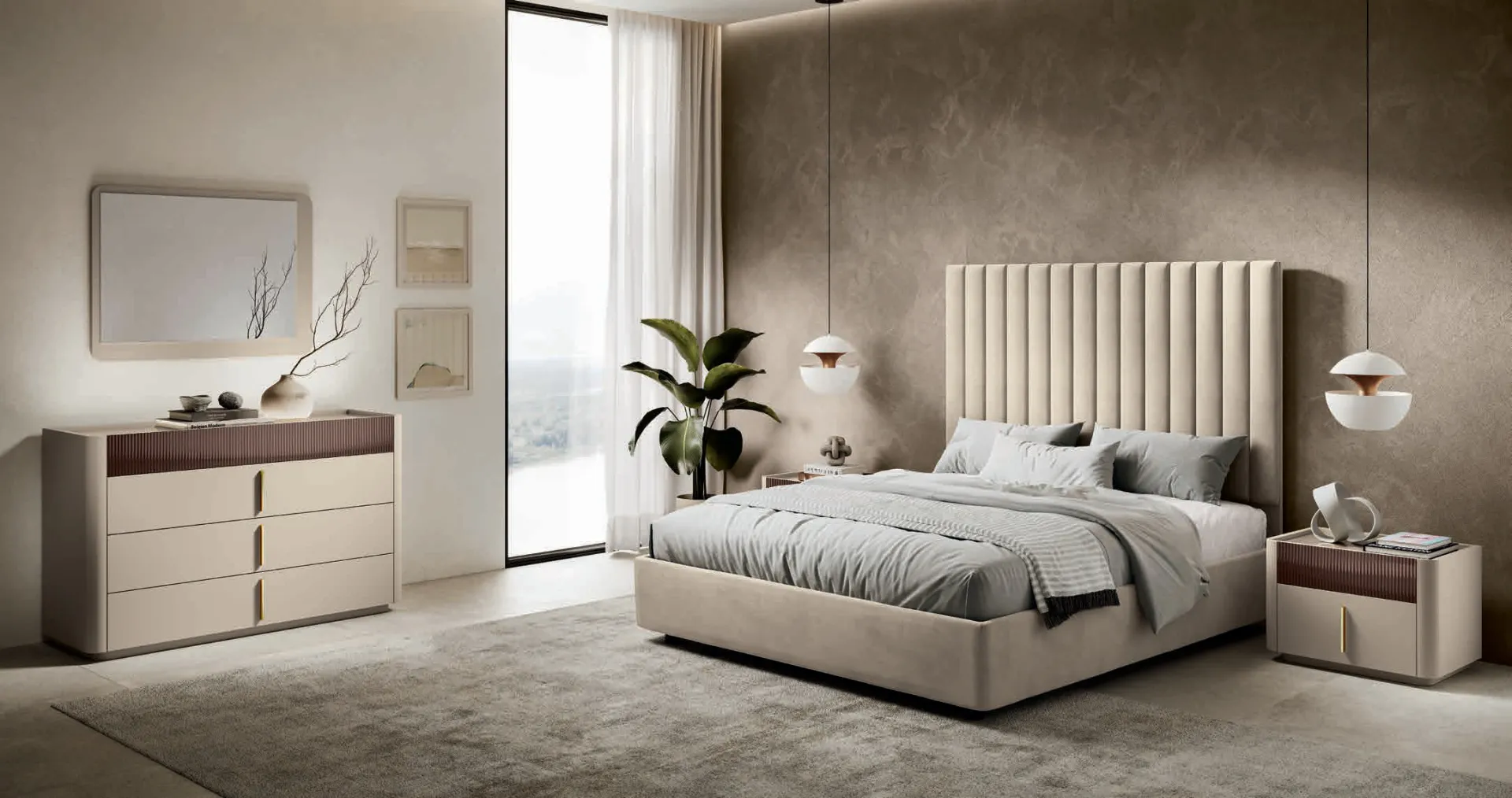 Comò e comodino Camilla Euro Design beige con maniglie oro accanto al letto