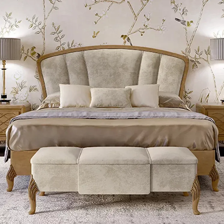 Letto con gambe intagliate Ocean Francesco Pasi con testata a spicchi e panca ai piedi