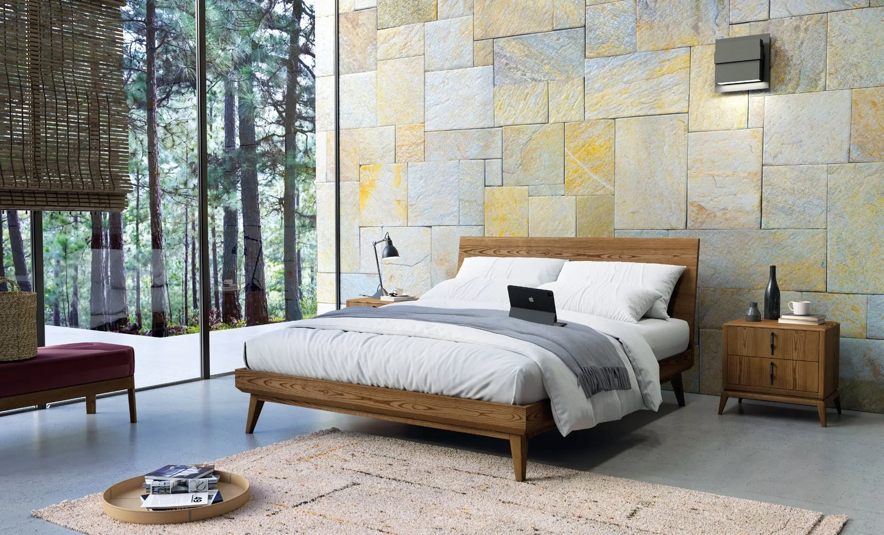Letto Nova Concept Imba in frassino Biscotto davanti a una parete in pietra