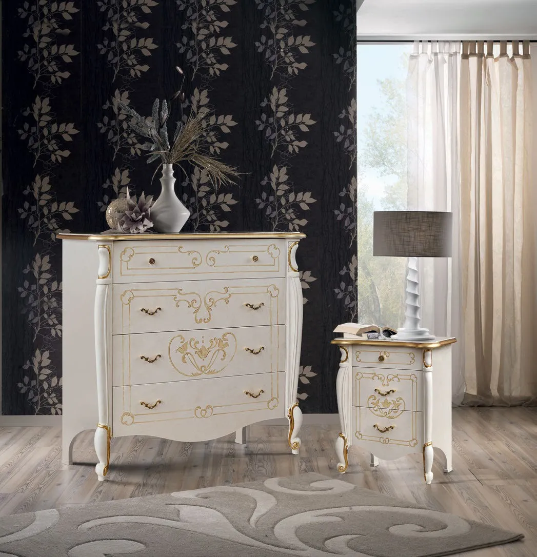 Comodino con intarsio Icon 2.0 Imba avorio con decori oro accanto al comò