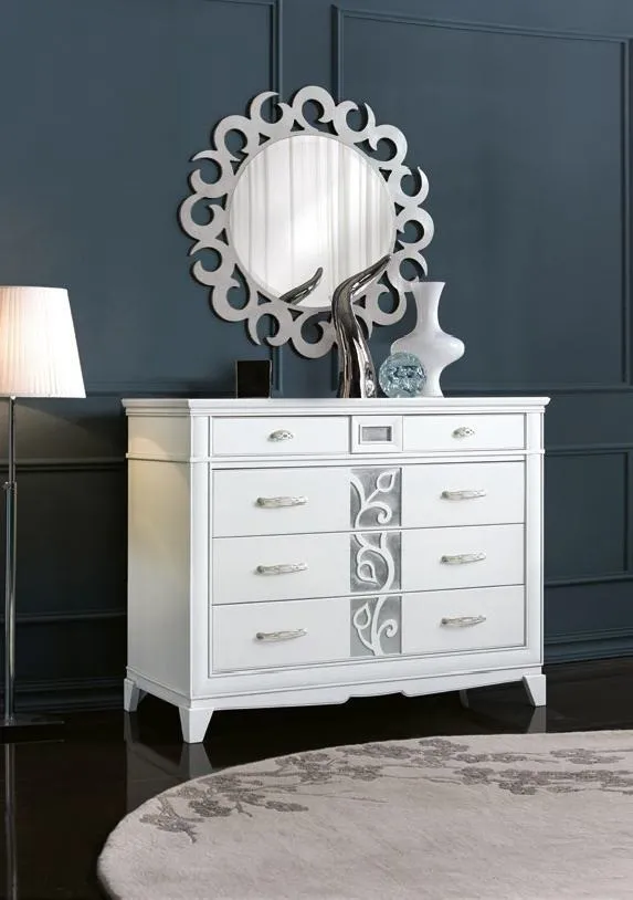 Comò alto Trend Style Imba bianco con segreto sotto una specchiera rotonda