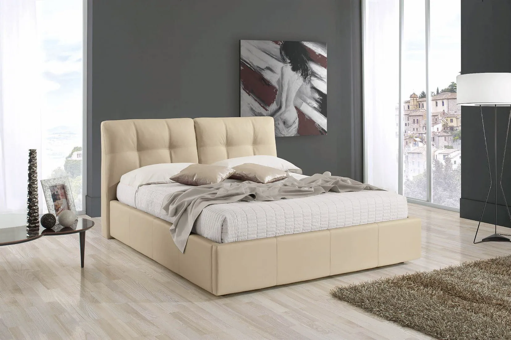 Letto imbottito Melia Imba in ecopelle crema con testata capitonné in camera