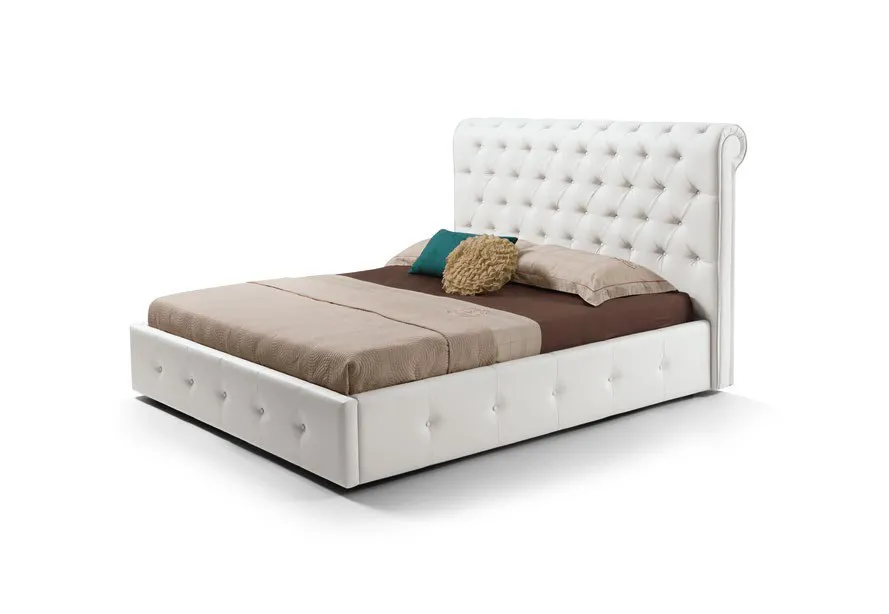 Letto Peninsula Imba bianco con testata a bottoni su fondo chiaro