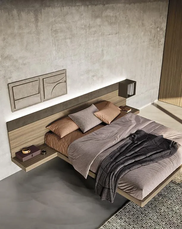Dettaglio del letto Wall System N06 MobilGam con piani laterali