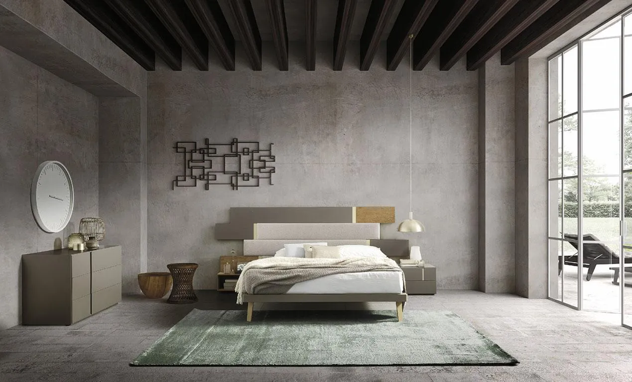 Camera con letto Regolo MobilGam e travi a vista
