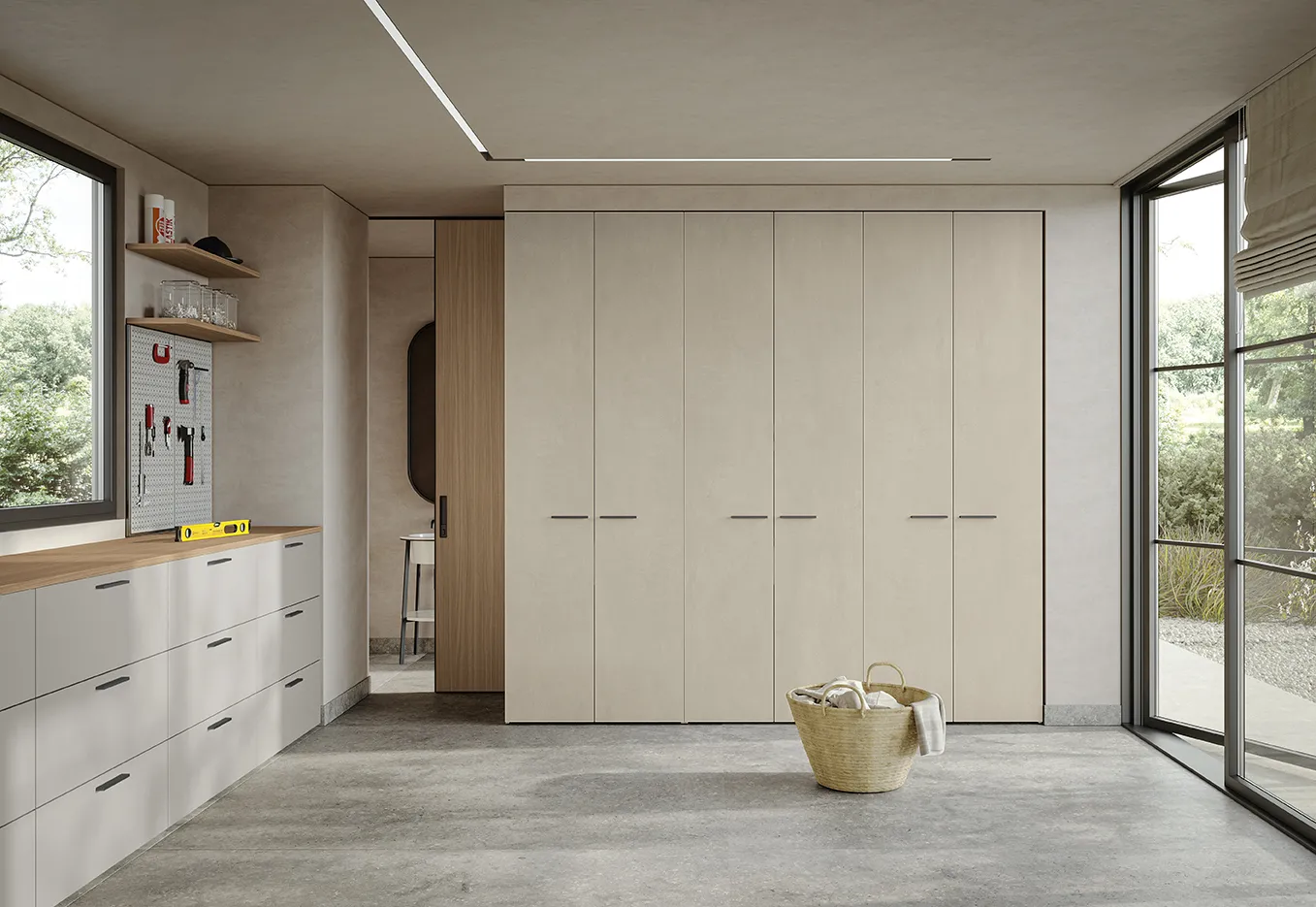 Parete di colonne chiare Golf Utility Space Colombini con banco da lavoro a cassetti