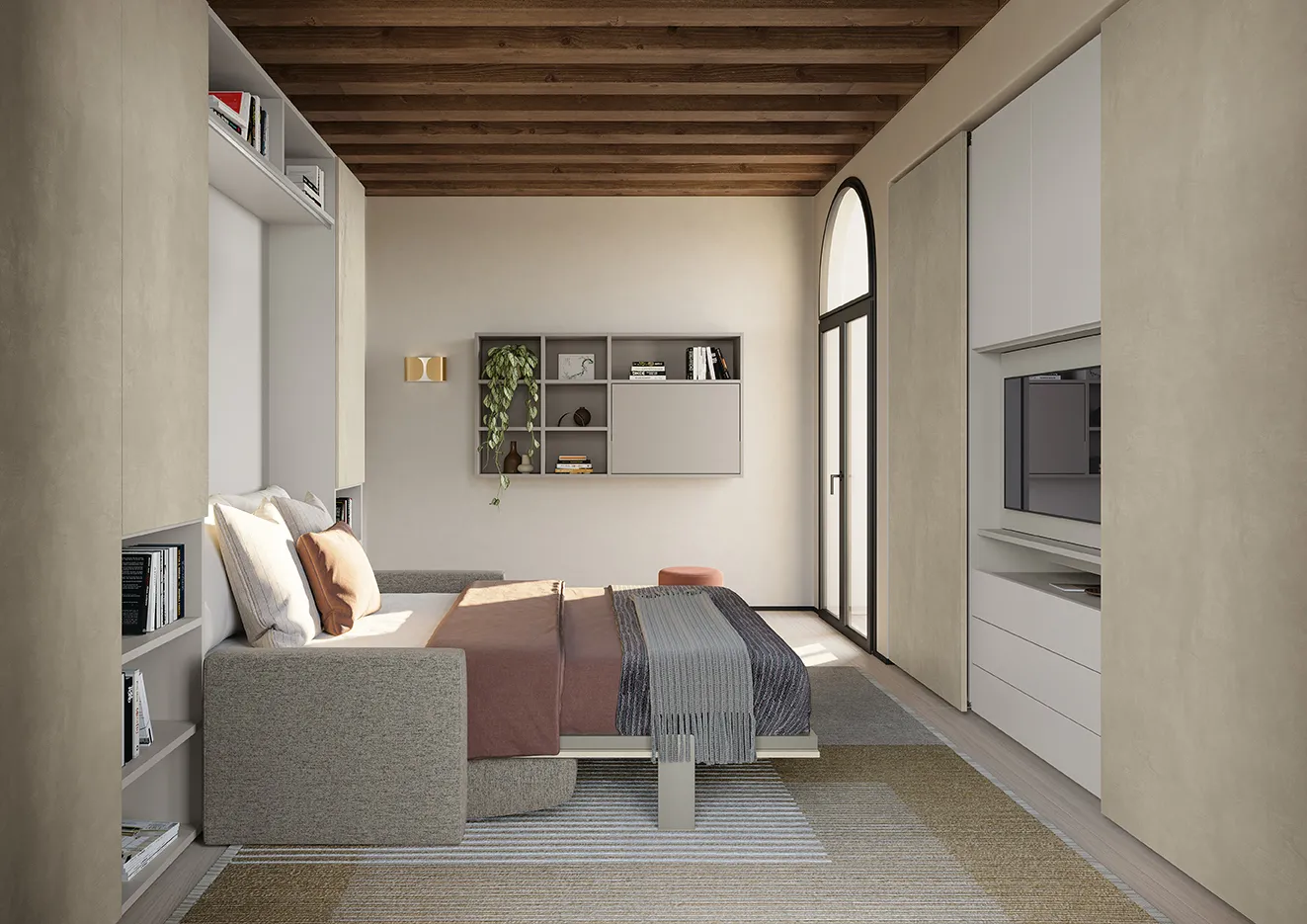 Camera ospiti Golf Utility Space Colombini con letto a scomparsa aperto sopra il divano e parete con vano tv
