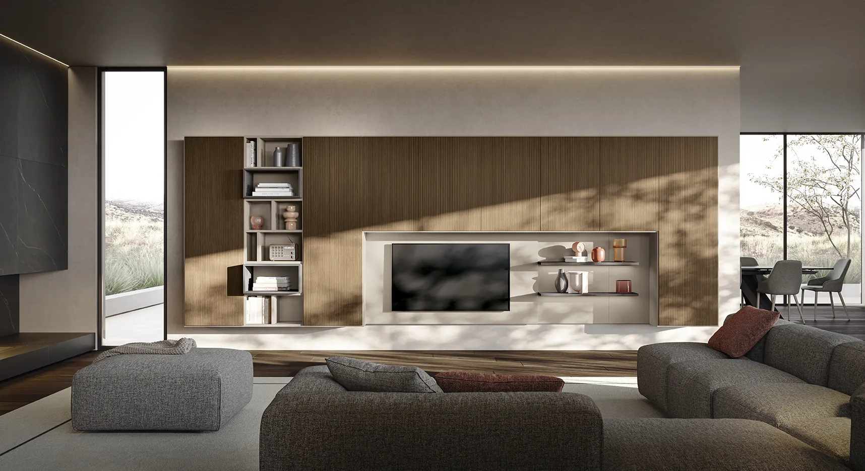 Soggiorno Living Space La villa Colombini con boiserie in legno scuro, cornice porta tv e colonna libreria