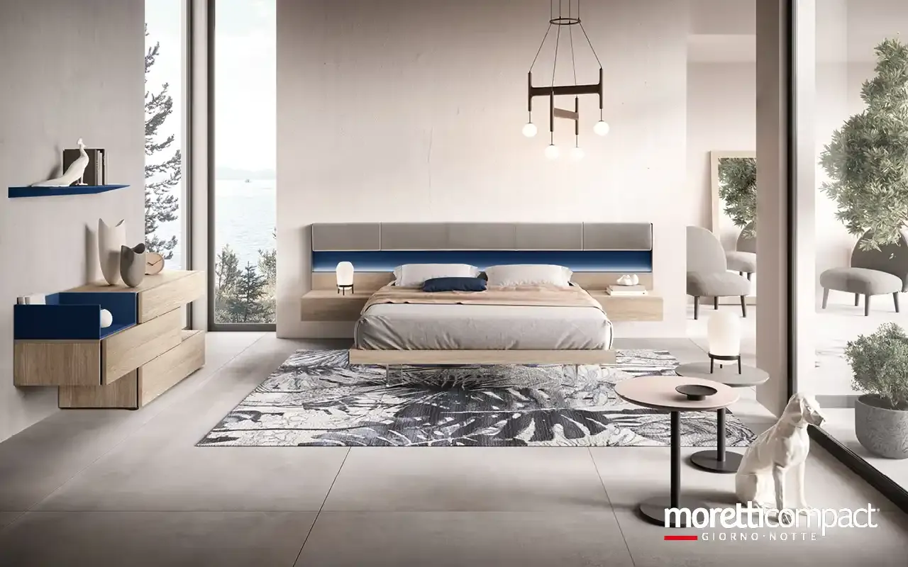 Camera da letto Modula M12 Moretti Compact con testata Strip Panels illuminata e comò sospeso