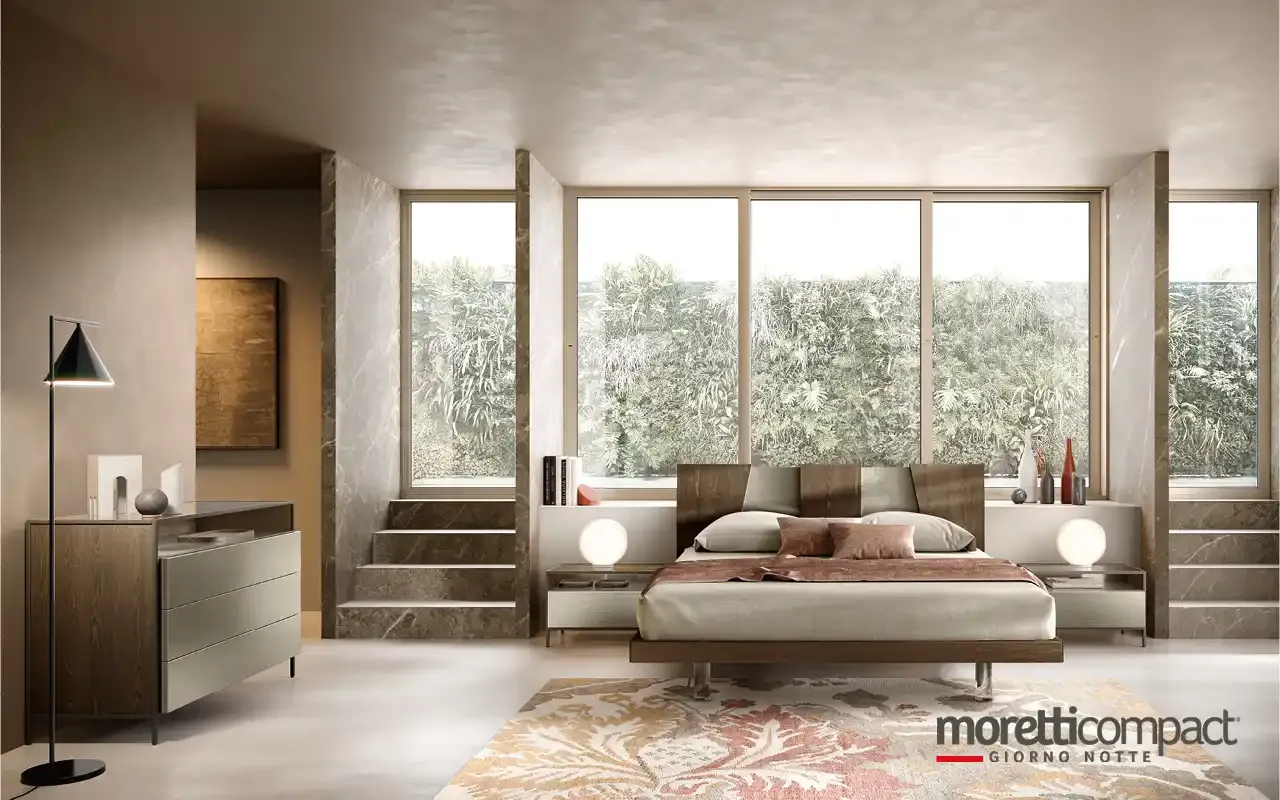 Camera da letto Frame F13 Moretti Compact con letto Cliff in rovere davanti alla vetrata