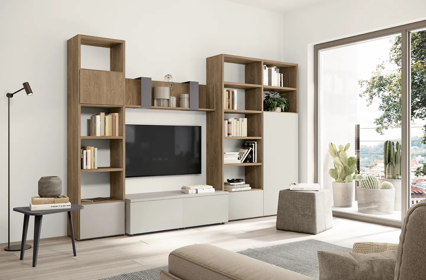 Soggiorno Volo Colombini con due librerie in legno ai lati di una base bianca porta tv