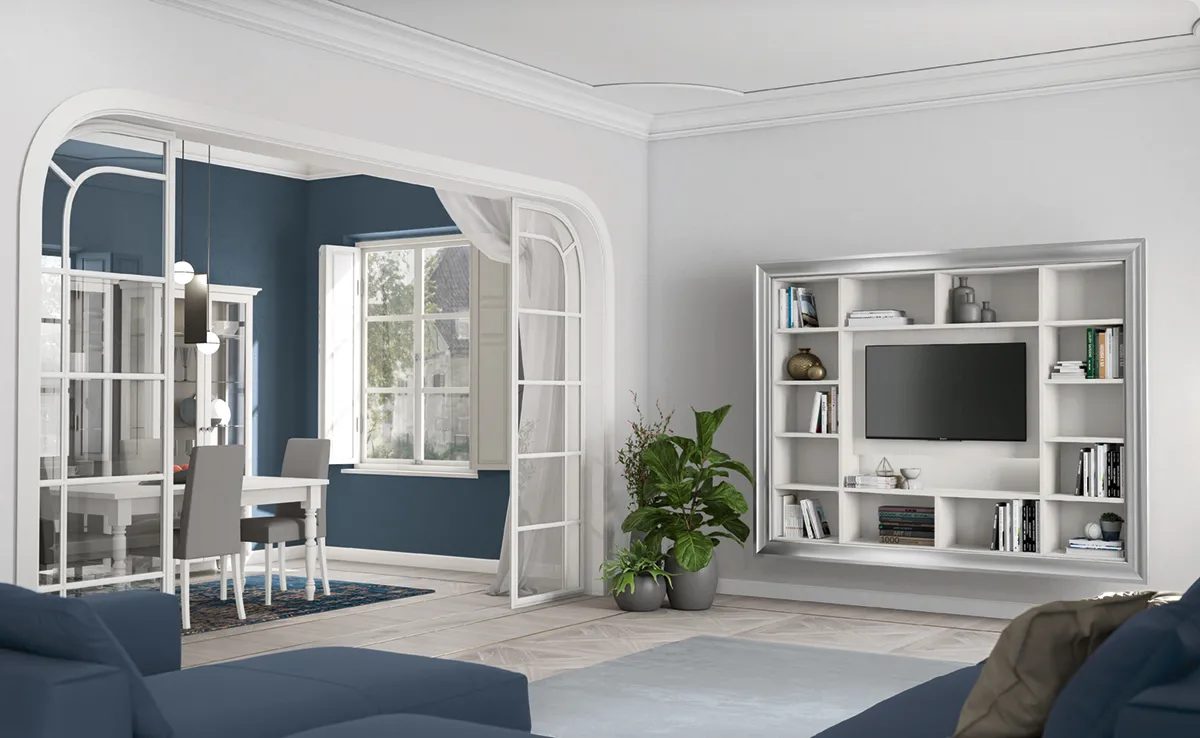 Libreria sospesa Arcadia Colombini a telaio in un salotto bianco con arco e parete blu