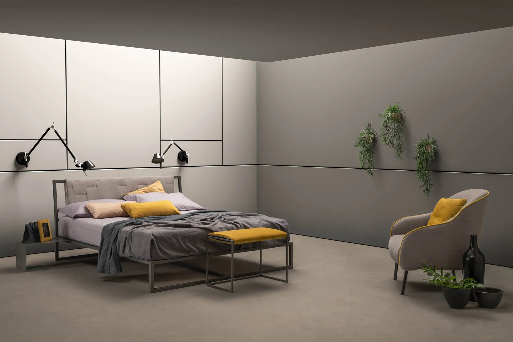 Letto matrimoniale Frame Samoa grigio con panca ai piedi, in una camera con poltroncina