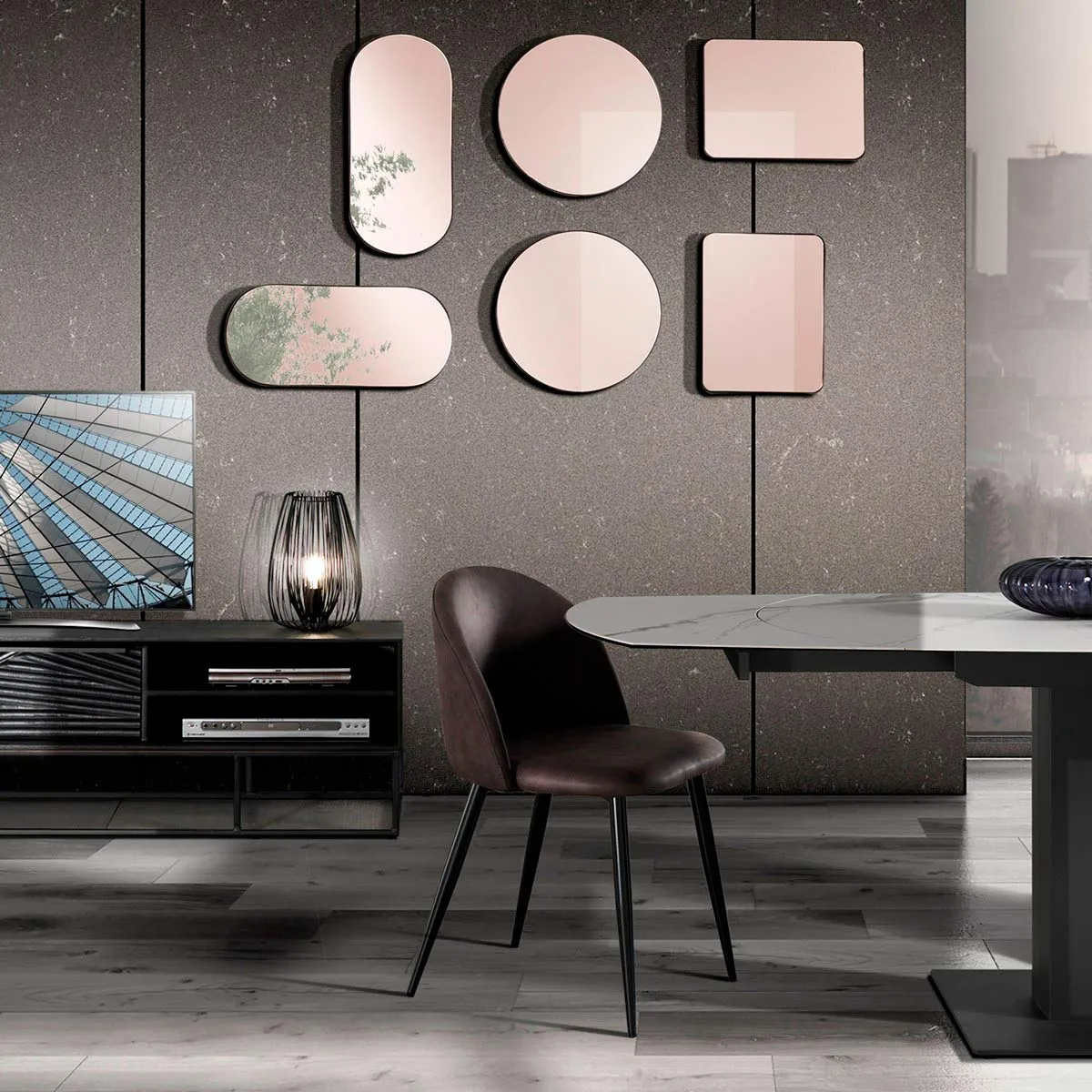 Composizione di specchi Afterlight Tomasucci su una parete
