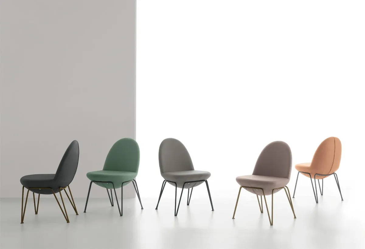 Sedie Vovo Target Point in cinque colori con scocca tonda e gambe sottili