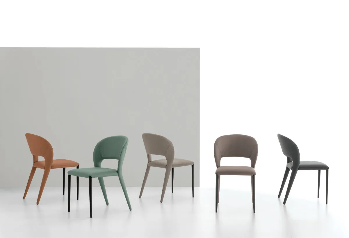 Sedie Fusion Target Point in arancio, verde, tortora e grigio