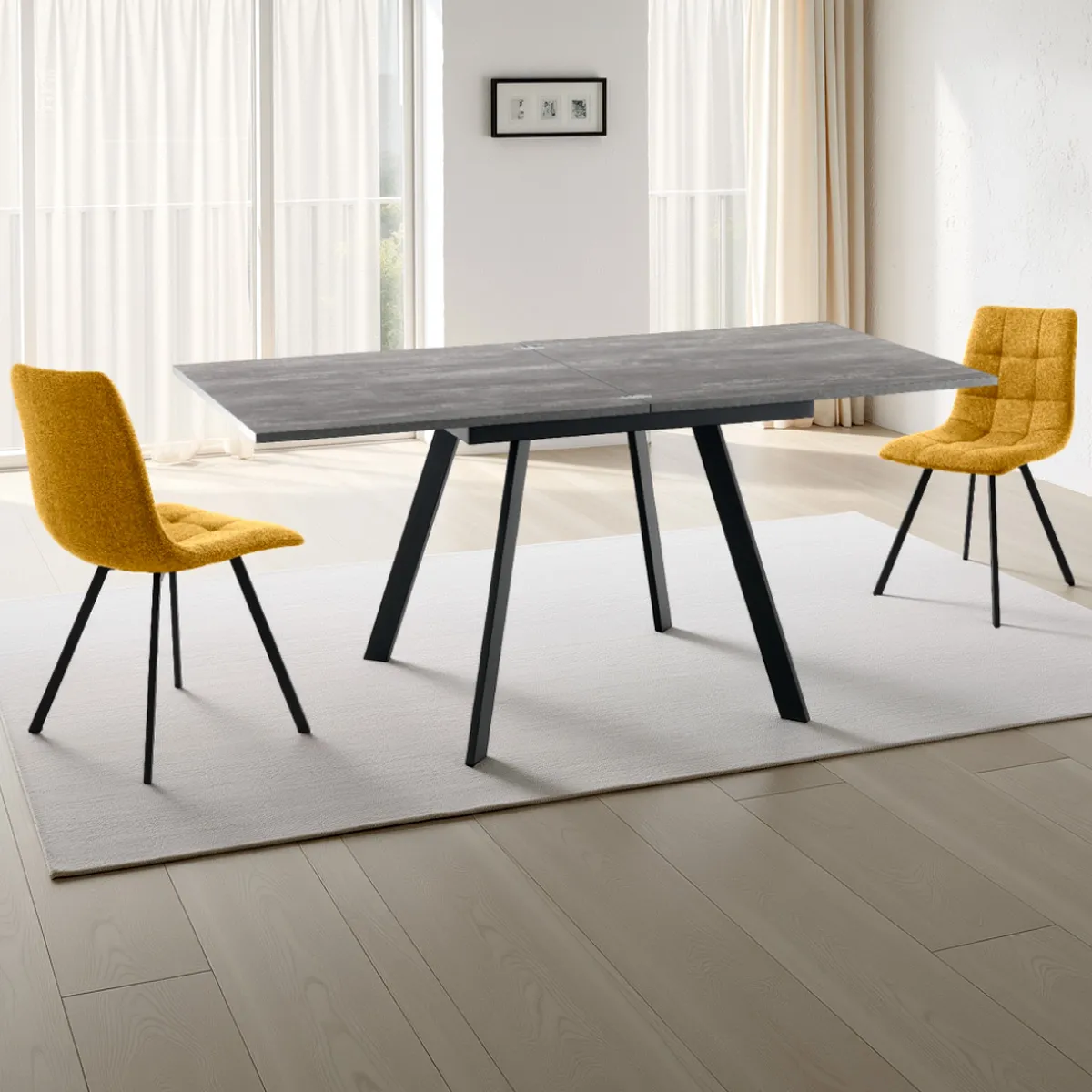 Tavolo Riky Cement Tomasucci con sedie gialle