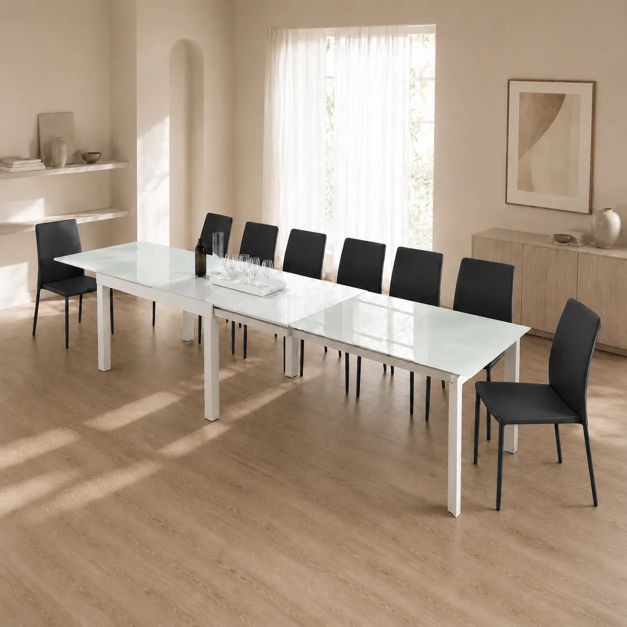 Tavolo allungabile Long White Tomasucci aperto con molte sedie
