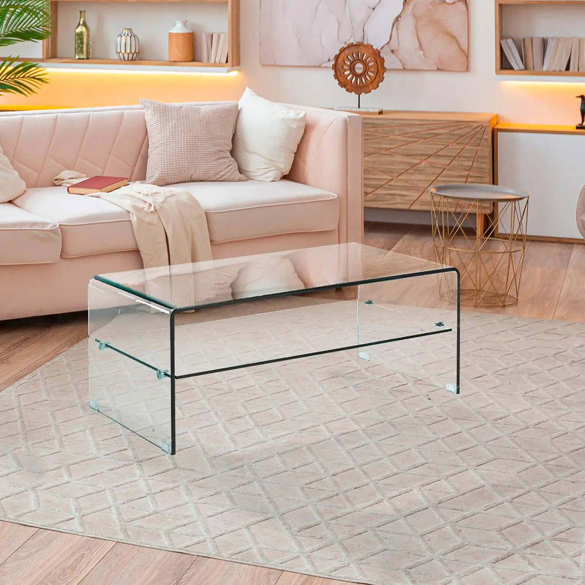 Tavolino Cristal Evo Tomasucci davanti a un divano rosa