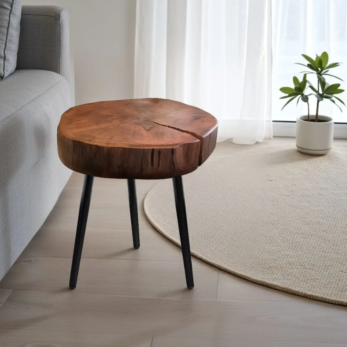 Tavolino rotondo Trunk-a Tomasucci in legno massello e metallo nero