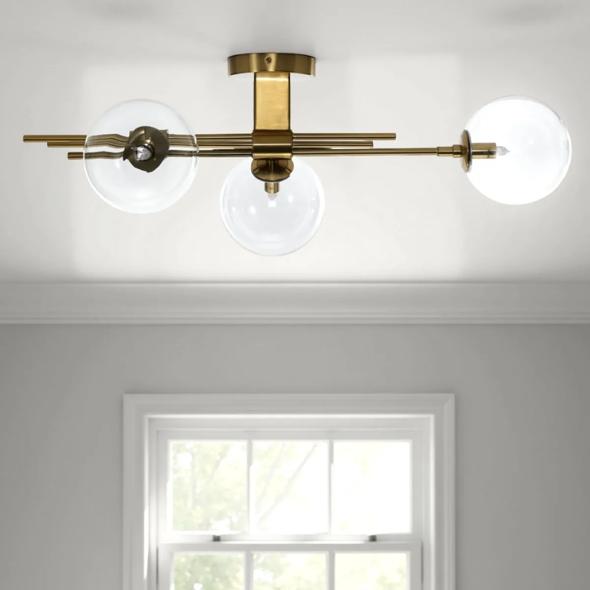 Lampadario Roy Tomasucci in ottone opaco