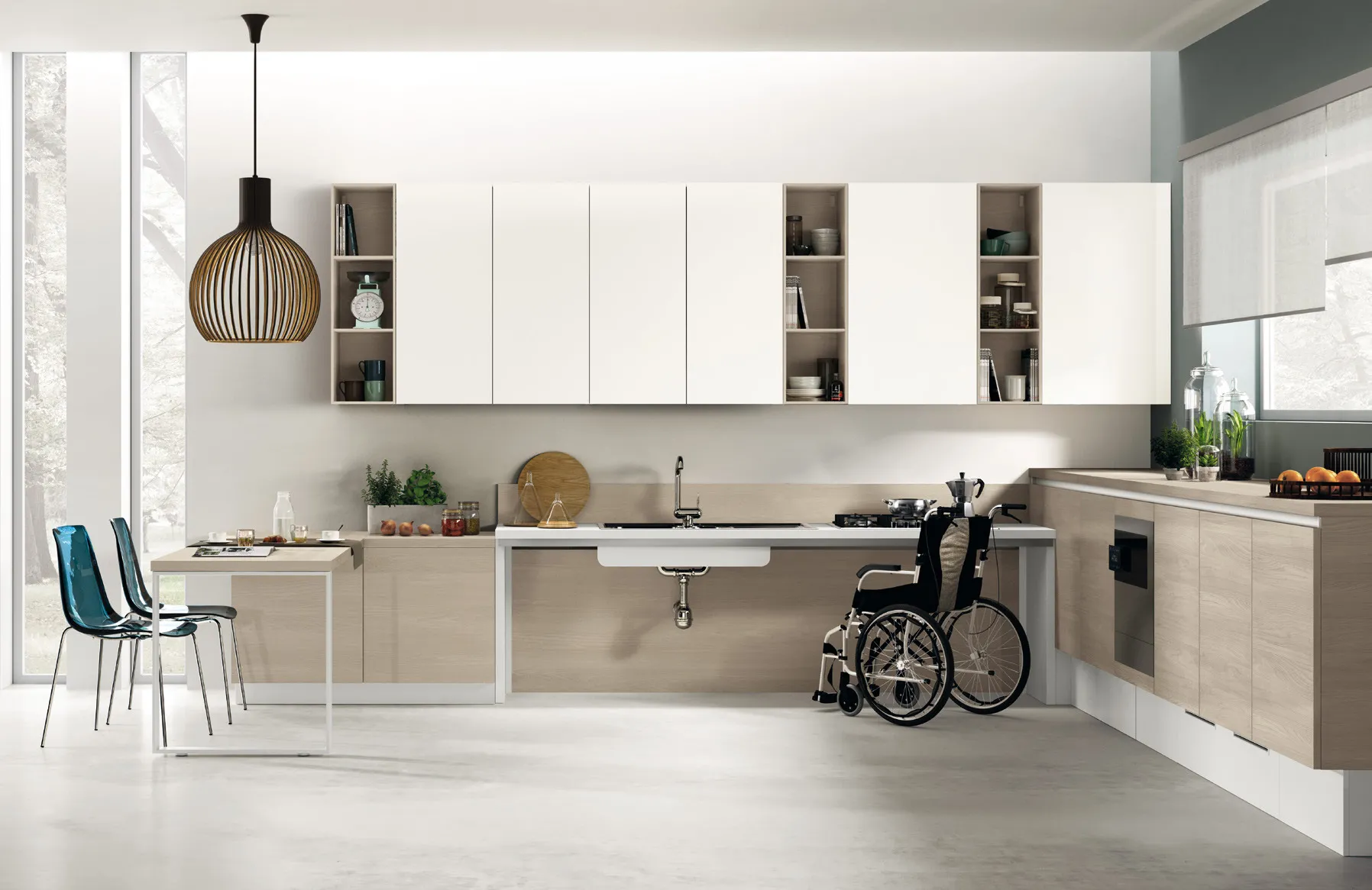 Cucina accessibile Utility System Scavolini con piano sospeso libero sotto e pensili bianchi, usabile in carrozzina