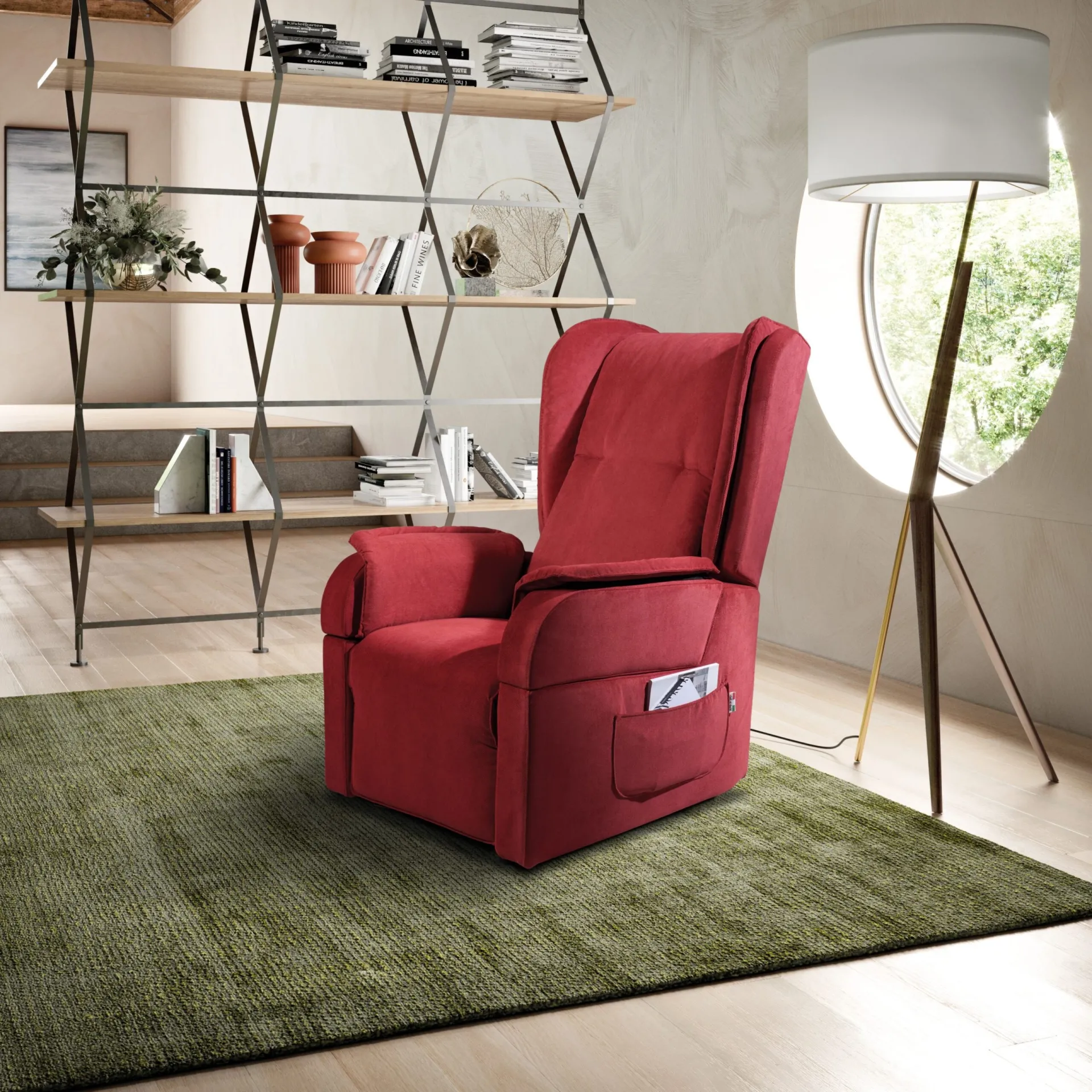 Poltrona relax alzapersona Isabel Plus Il Benessere rossa su tappeto verde