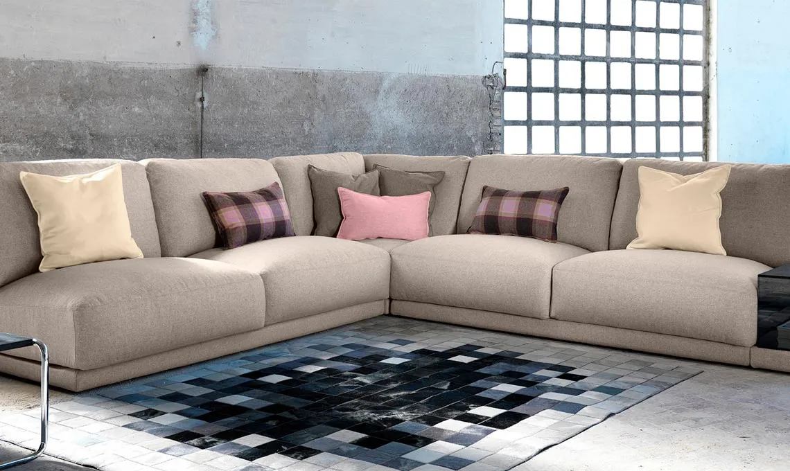 Divano componibile Doyle Domingo ad angolo in un loft