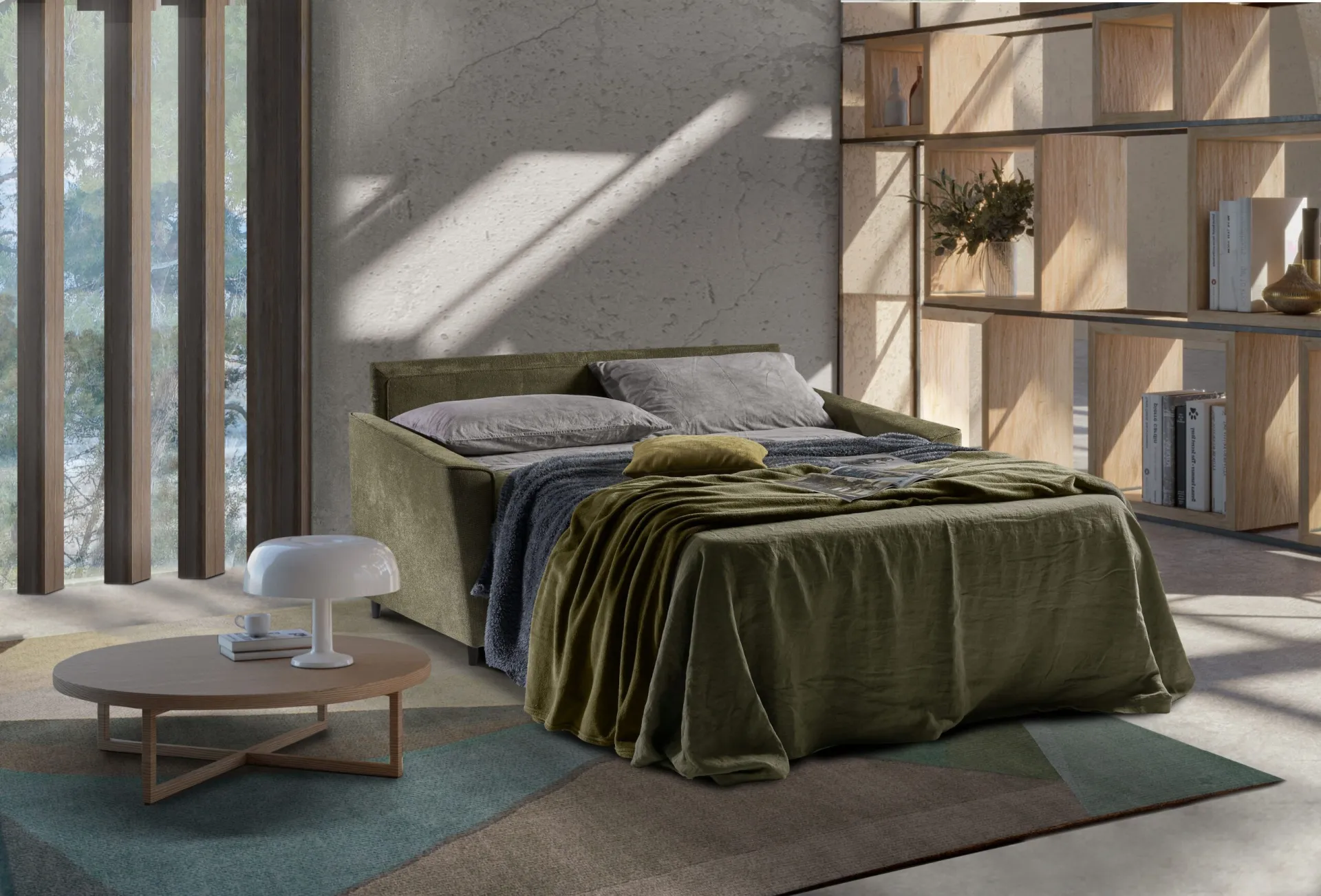 Divano Bingo Il Benessere aperto a letto con coperta verde