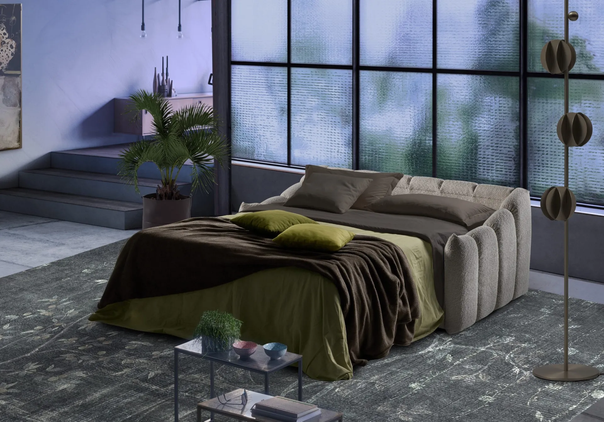 Divano Bon Bon Il Benessere aperto a letto con coperta verde