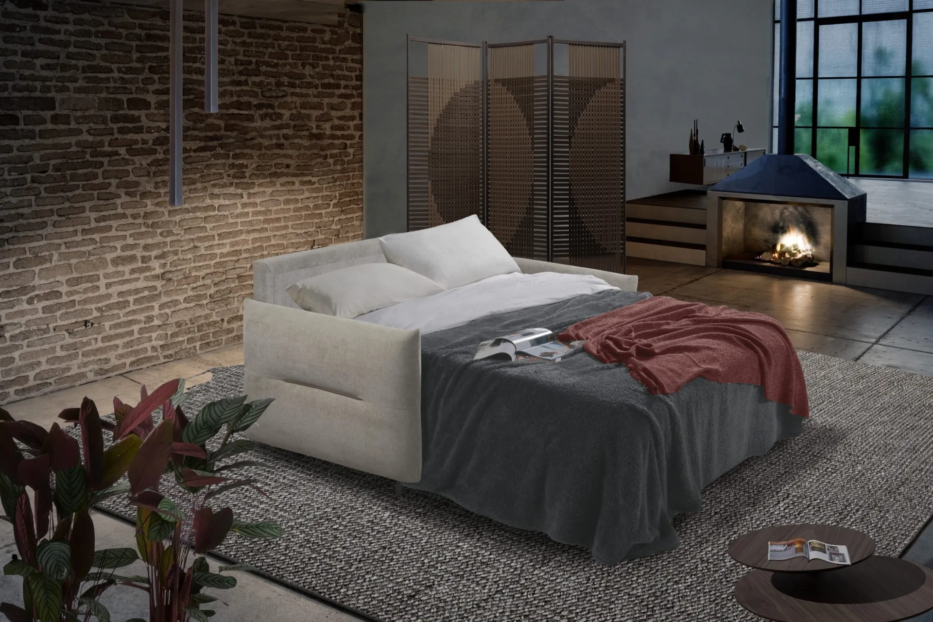 Divano Eolo Il Benessere aperto a letto con plaid rosso