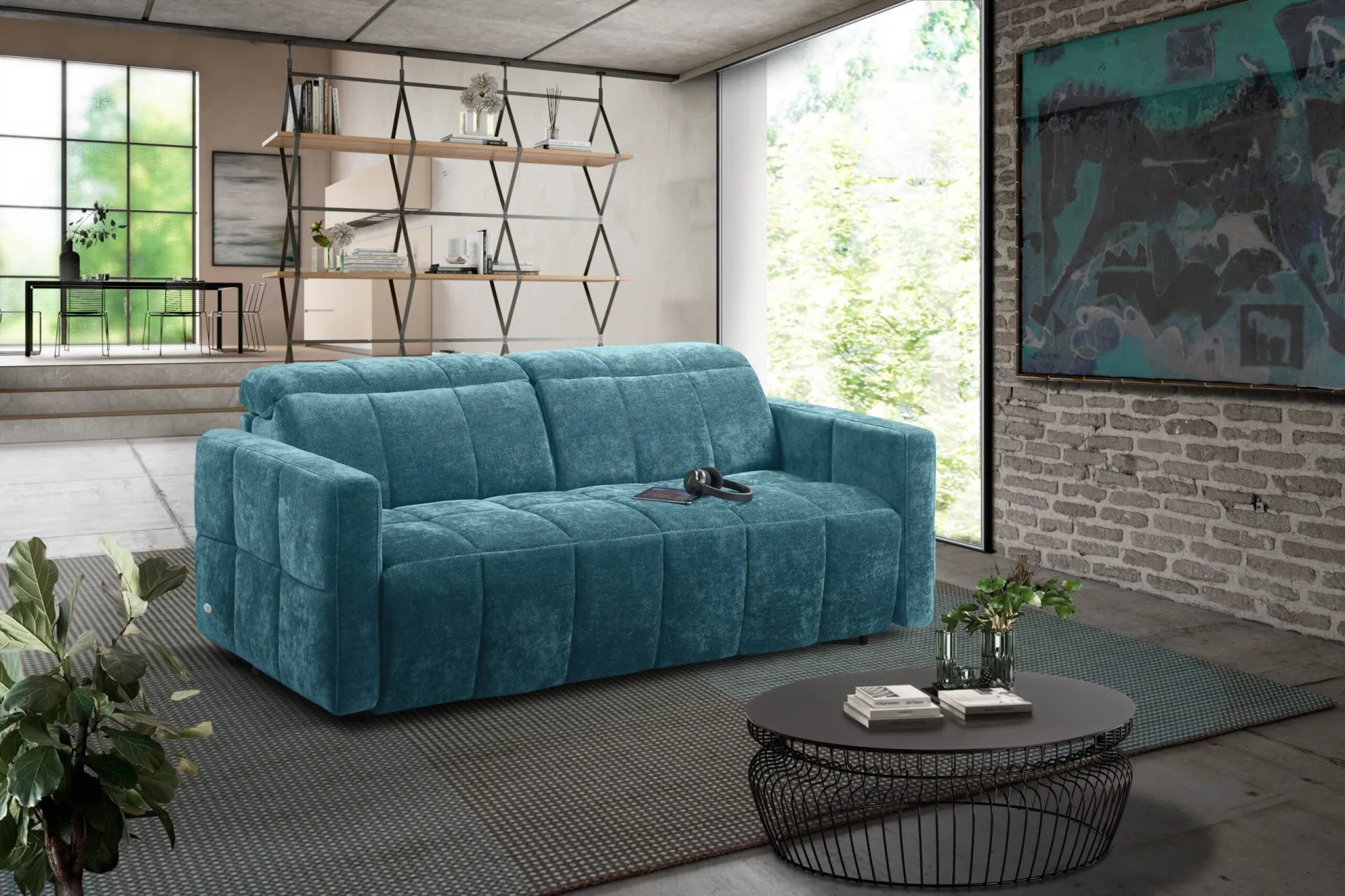 Divano letto Kubik Il Benessere azzurro in un loft con libreria in metallo