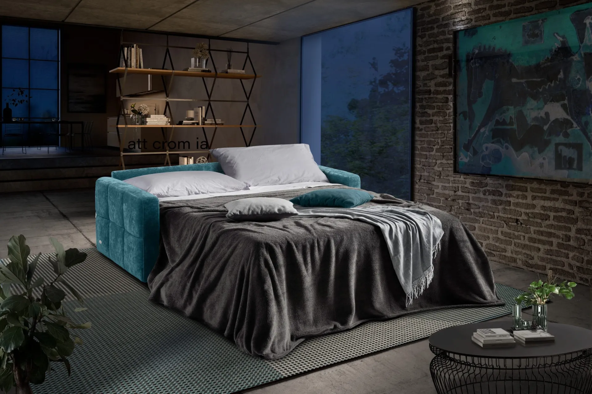 Divano Kubik Il Benessere aperto a letto con coperta grigia