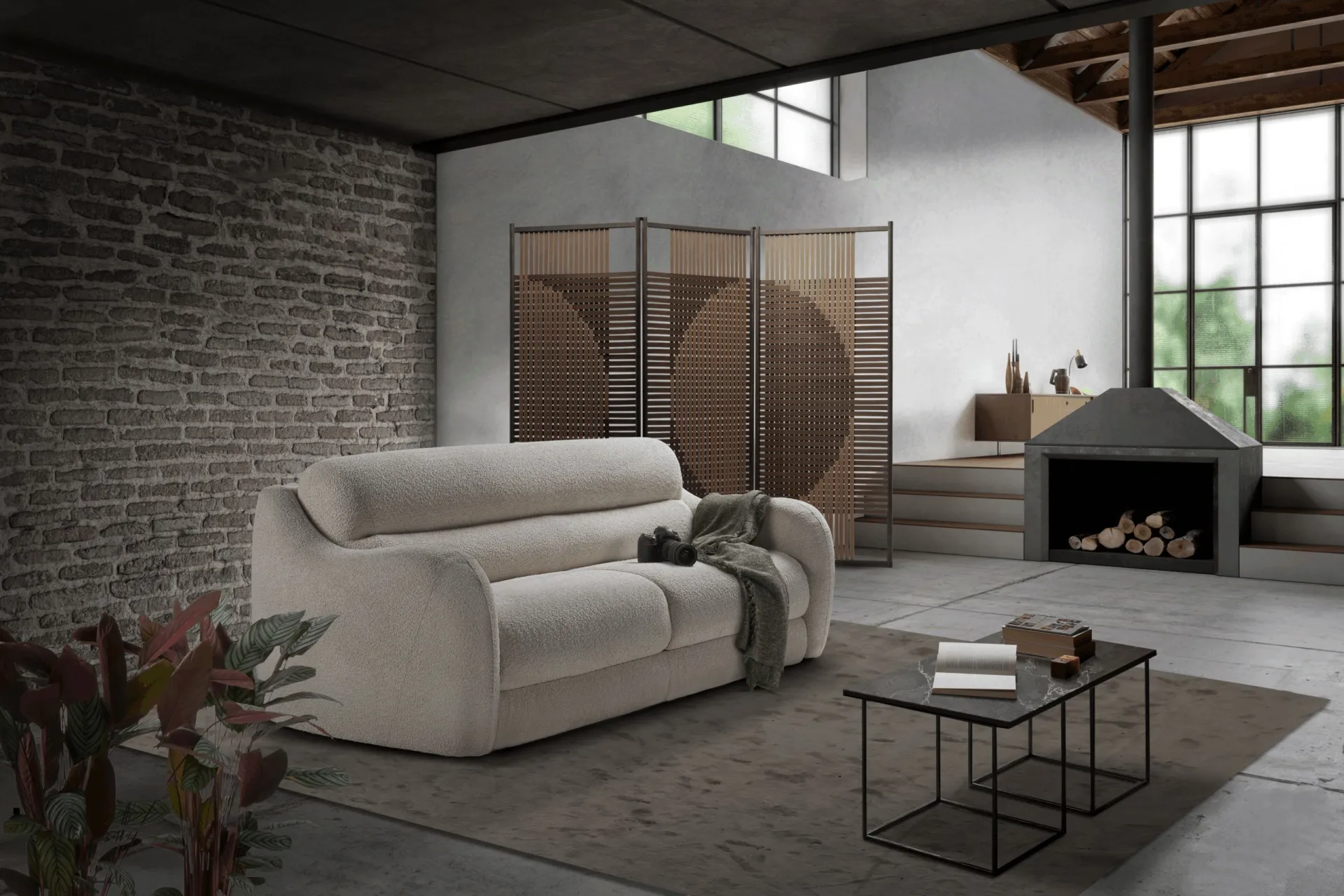 Divano letto Pagoda Il Benessere color panna in un loft con mattoni a vista
