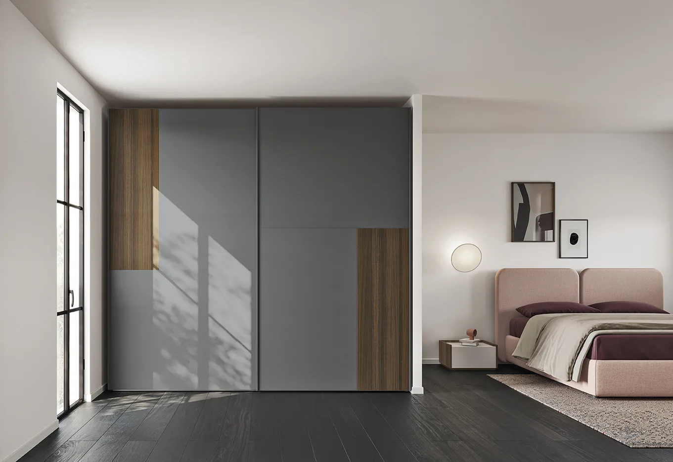 Armadio scorrevole Colombini Wardrobes grigio con inserti in legno accanto a un letto imbottito rosa