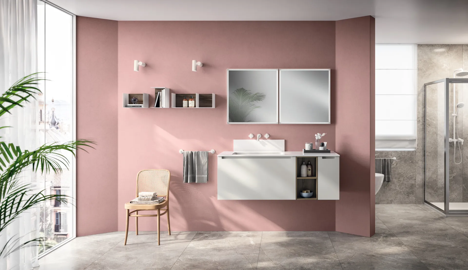 Bagno Idro Scavolini con base sospesa Grigio Airone, mensole a giorno e parete rosa