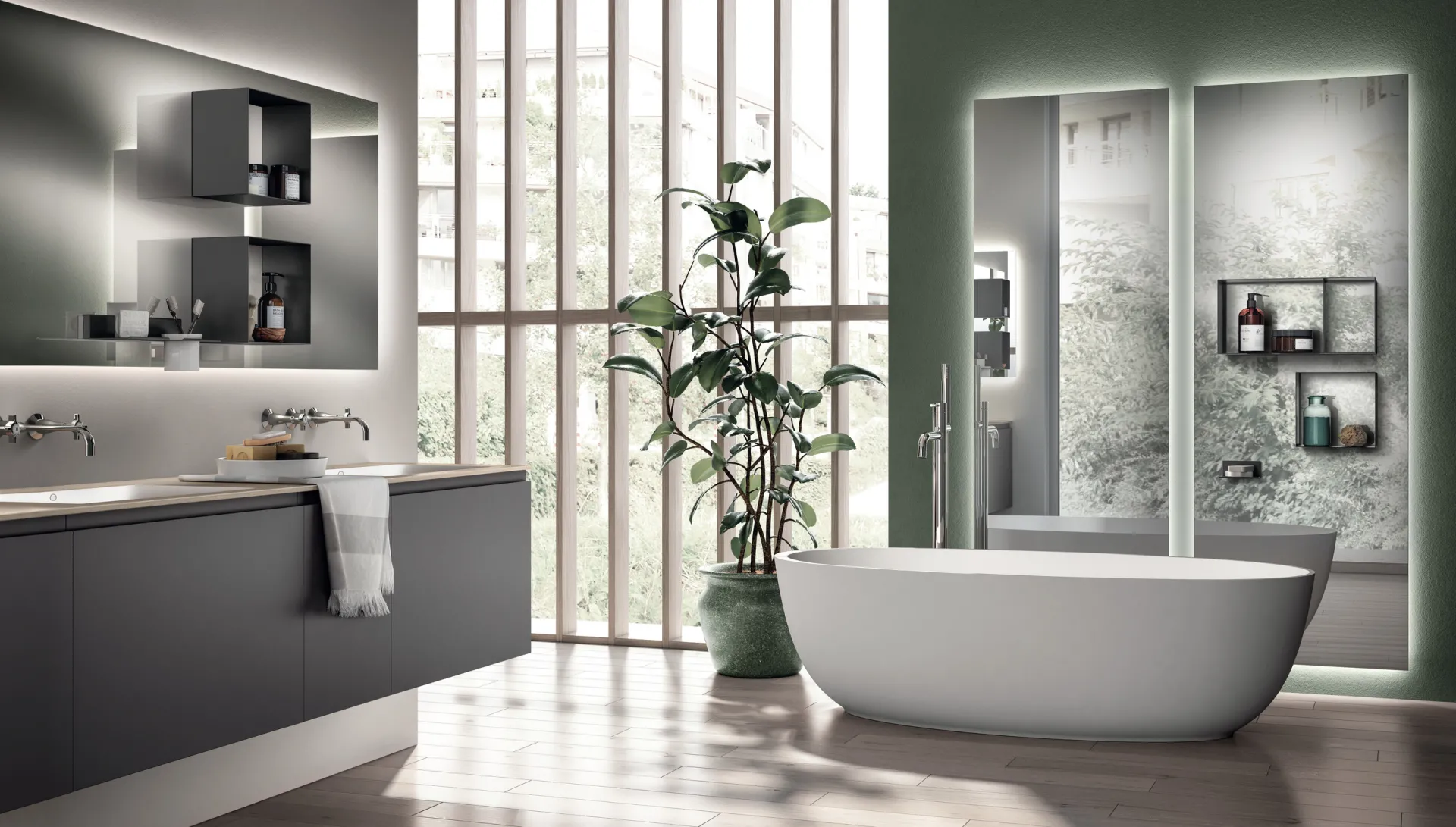 Bagno Juno Scavolini con base scura sospesa, specchi retroilluminati e vasca freestanding davanti alla vetrata