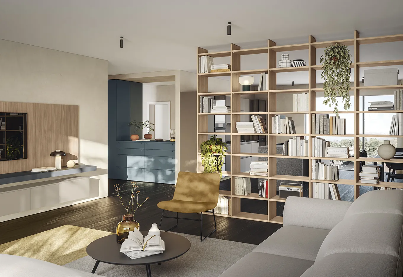 Appartamento Golf Contract Space Colombini con libreria divisoria in legno e colonne blu sullo sfondo