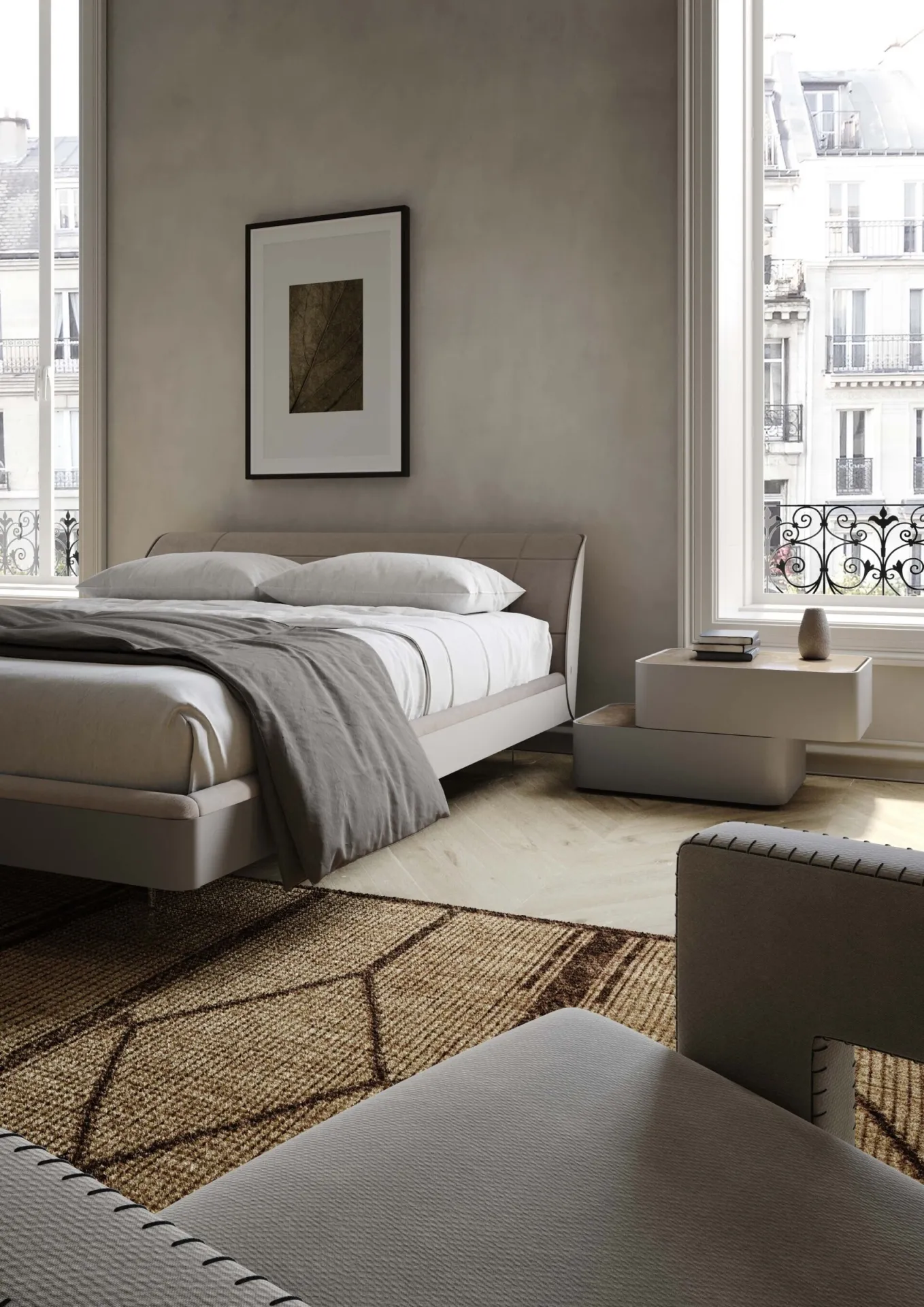 Particolare del letto Prestige Voltan con giroletto laccato e comodino Elite