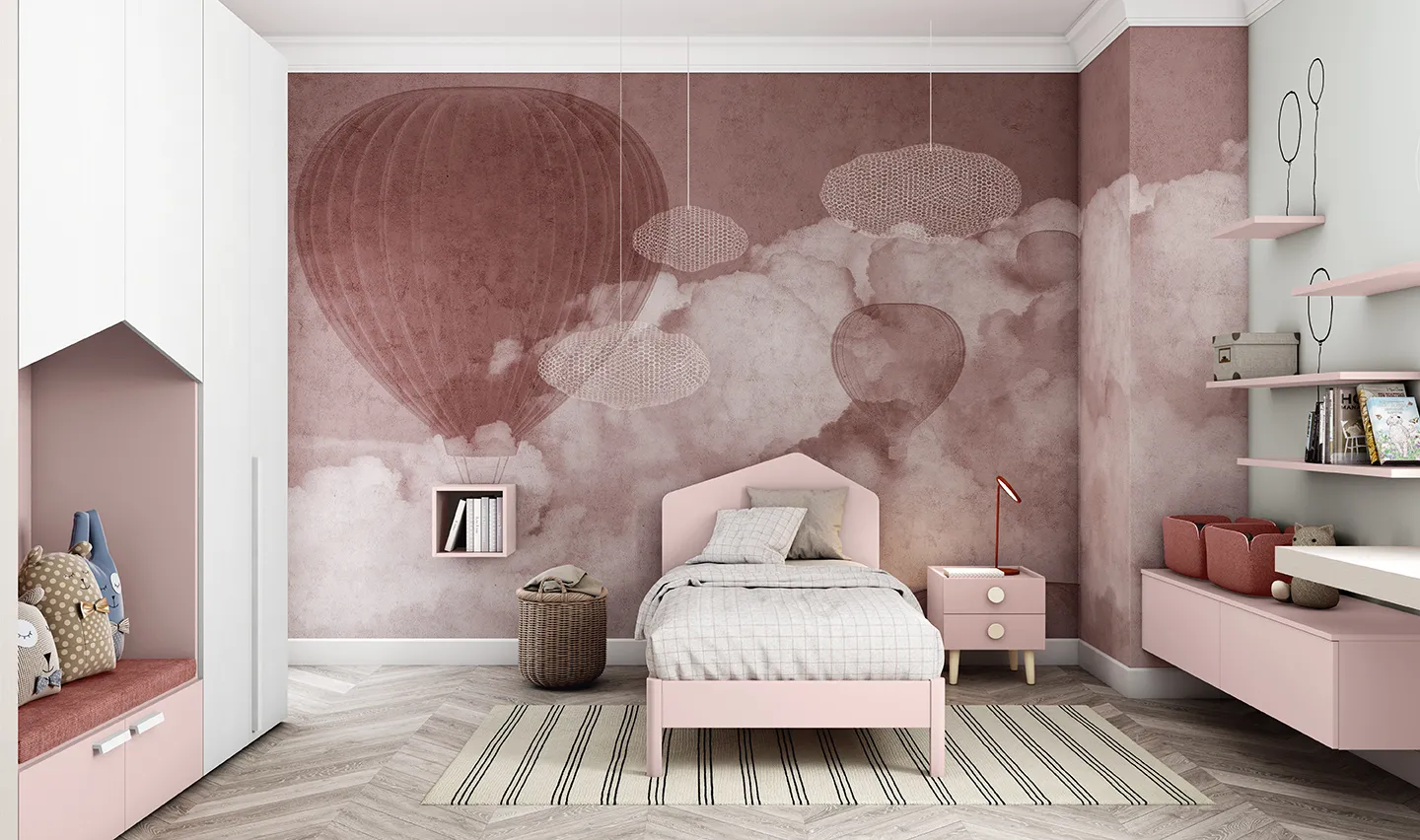 Letto Roof Colombini rosa chiaro davanti a una carta da parati con mongolfiere