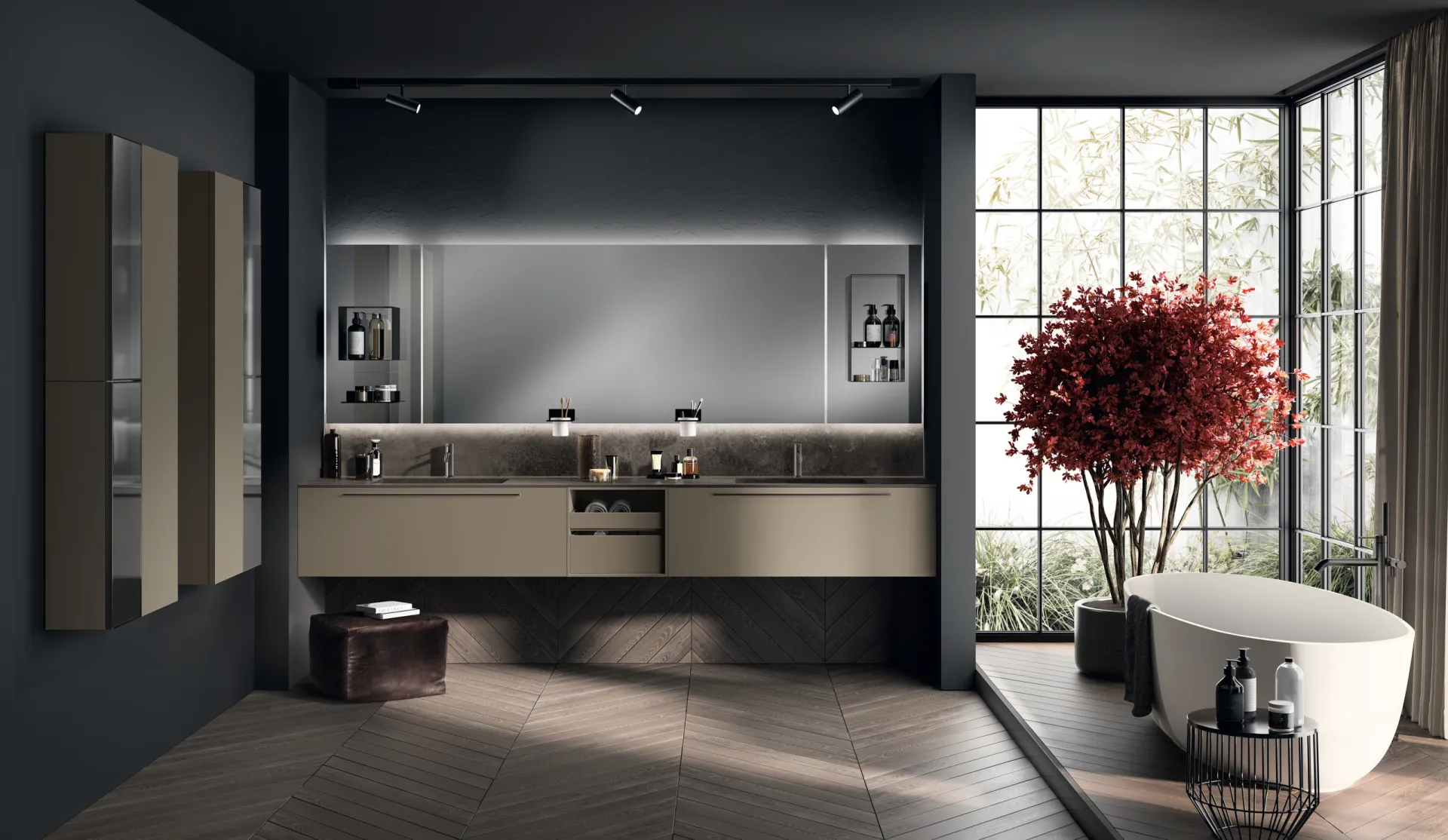 Bagno Aquo Scavolini con base Grigio Matera, specchio illuminato e vasca freestanding vicino alla vetrata