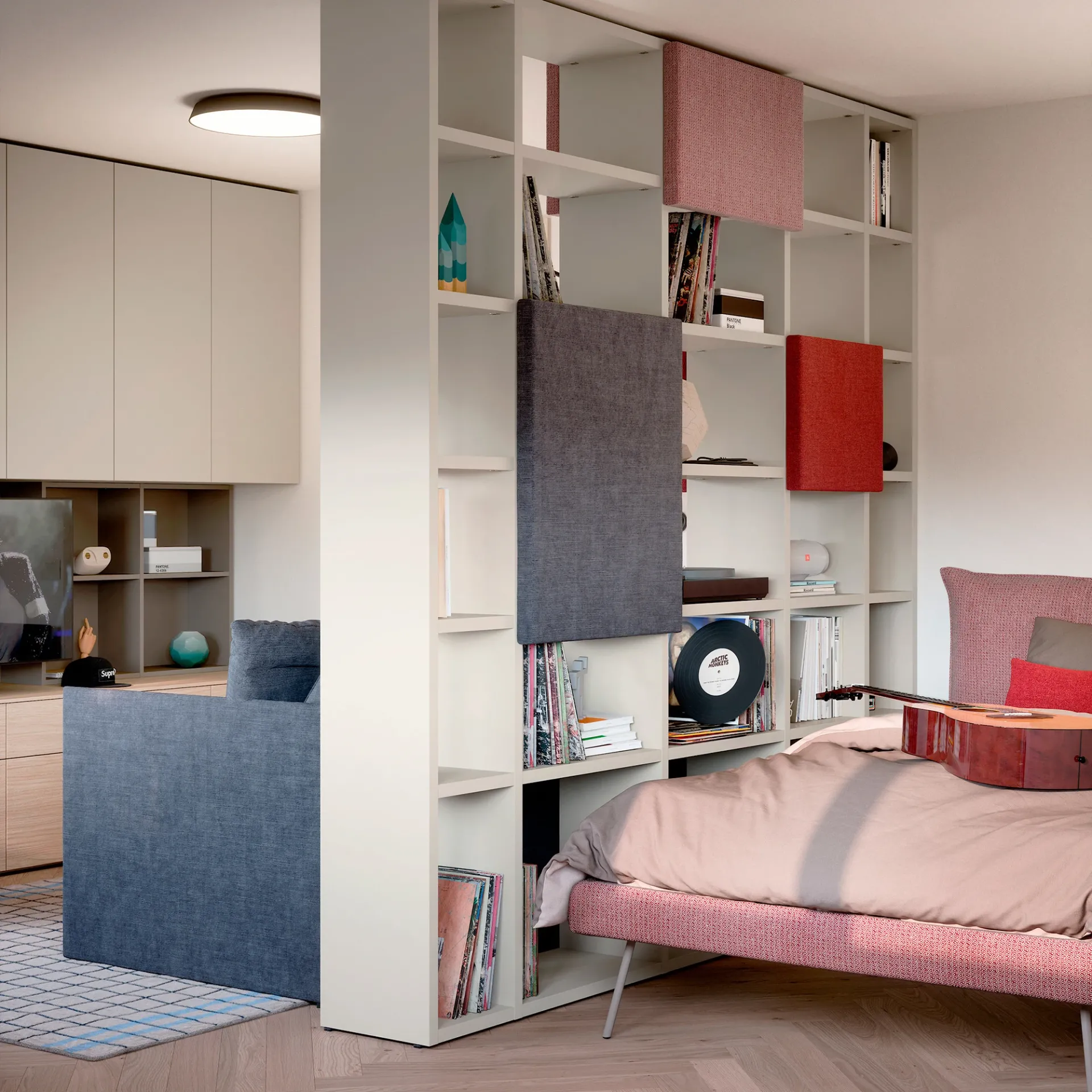 Libreria Holly Nidi bifacciale usata come divisorio accanto a un letto rosa