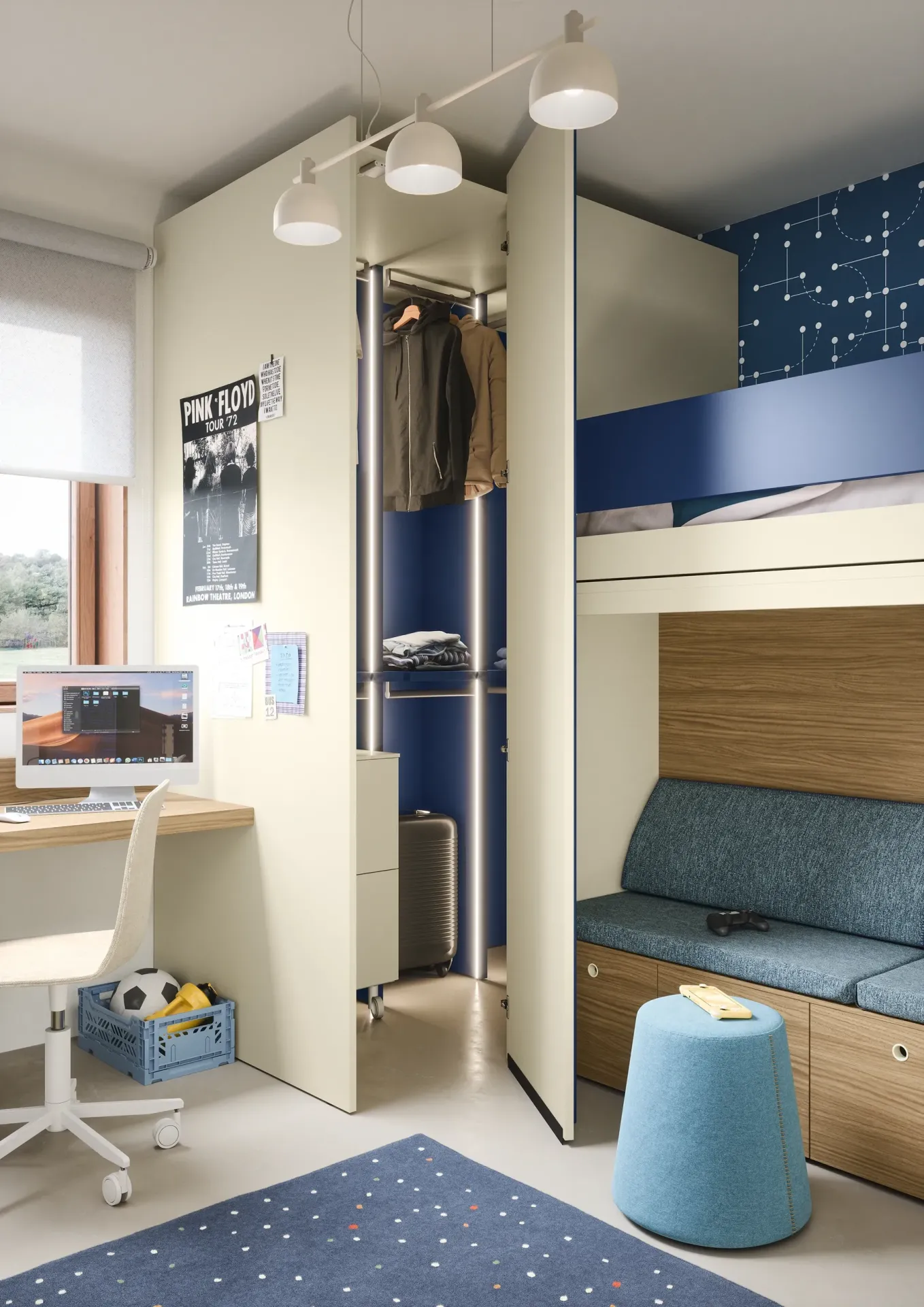 Cabina armadio Cabì Nidi blu accanto a un letto a castello