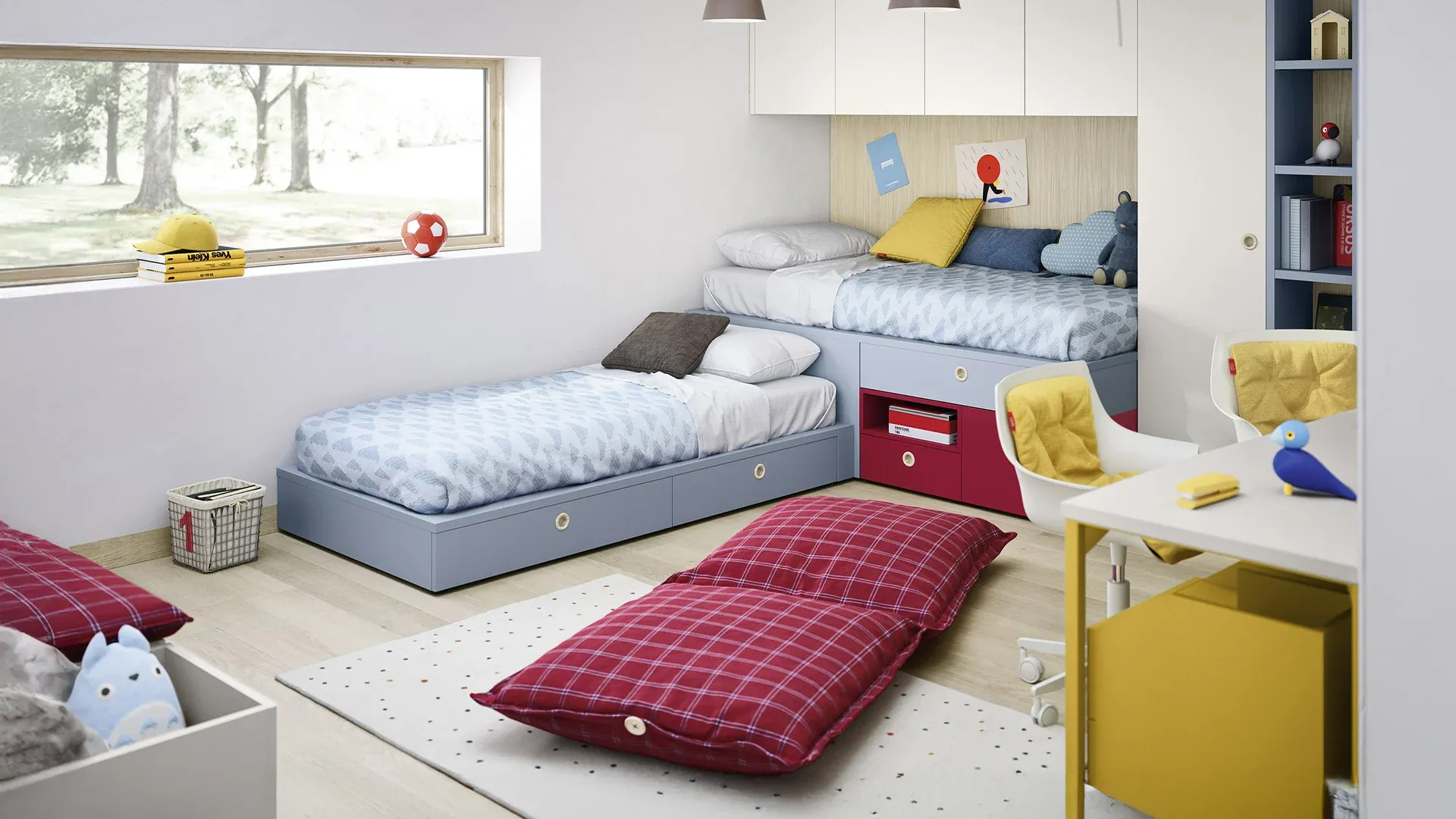 Letto Regoli Nidi azzurro su pianale con cassetto rosso e scrivania gialla