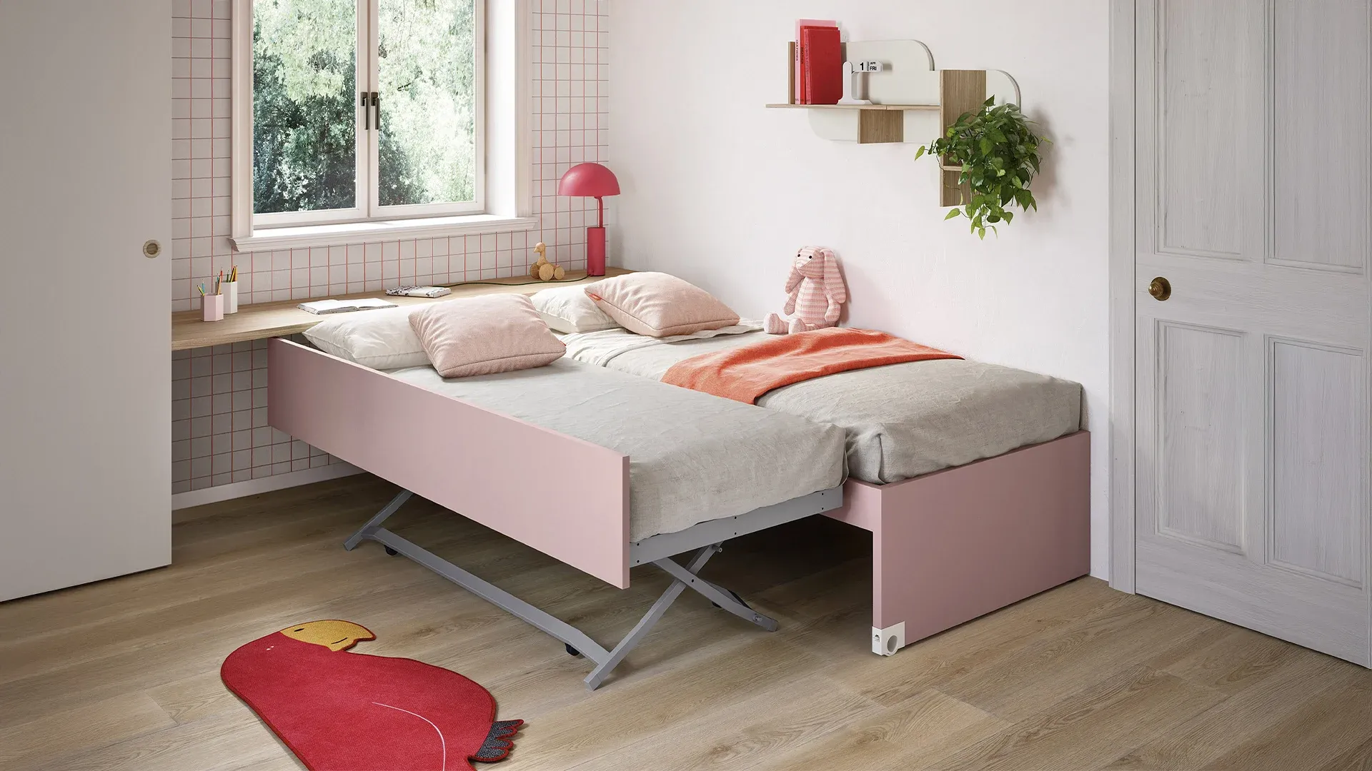 Letto estraibile Nidi rosa con gambe estese alla stessa altezza